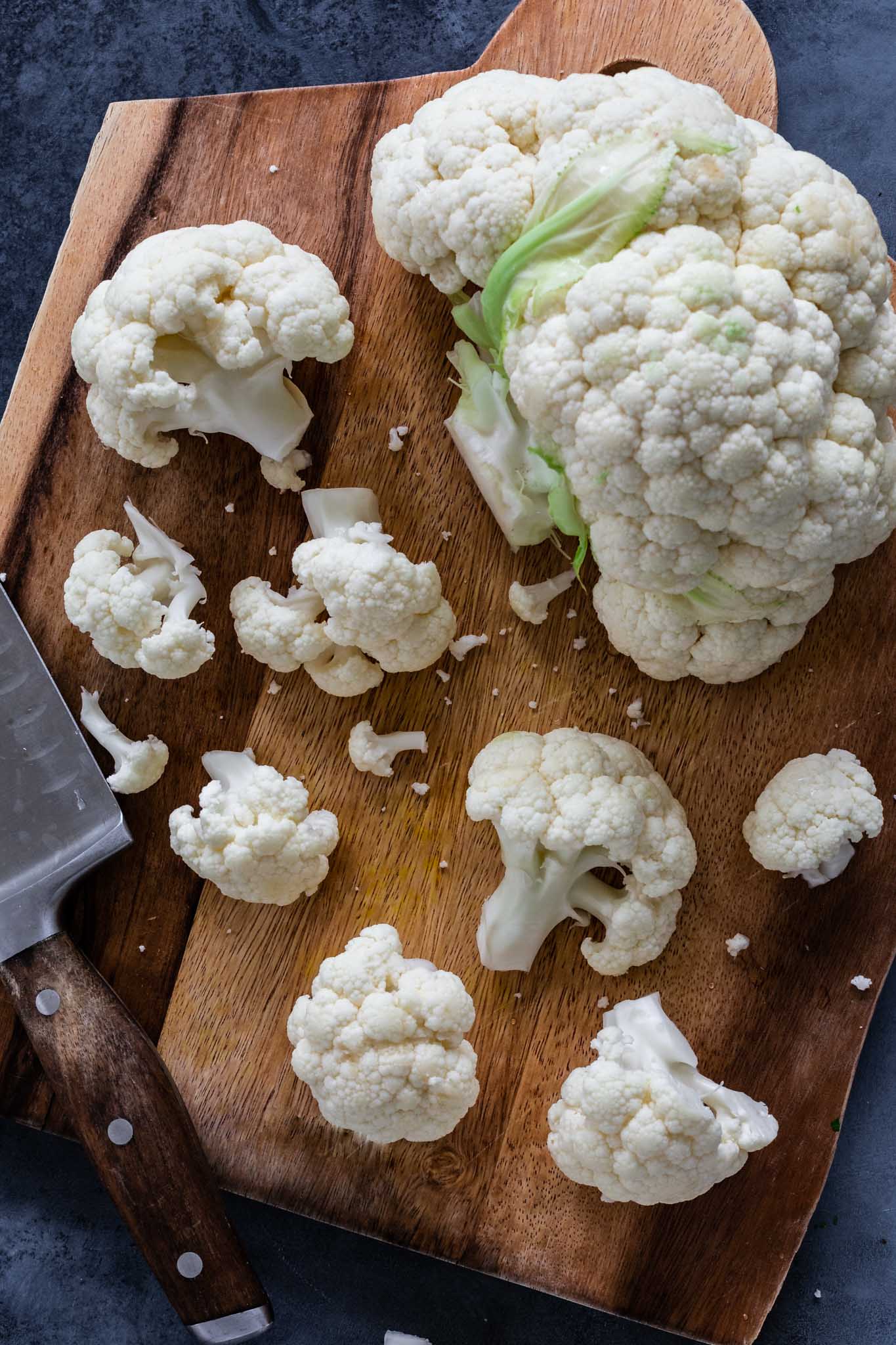 Fresh cauliflower being chopped