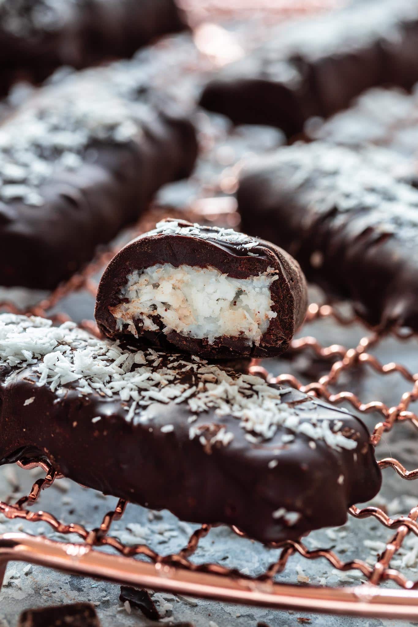 Close up of low carb coconut bar covered in chocolate