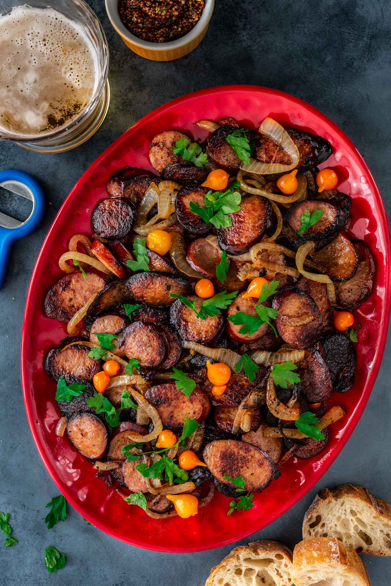 a platter of flambeed kielbasa sausage bites