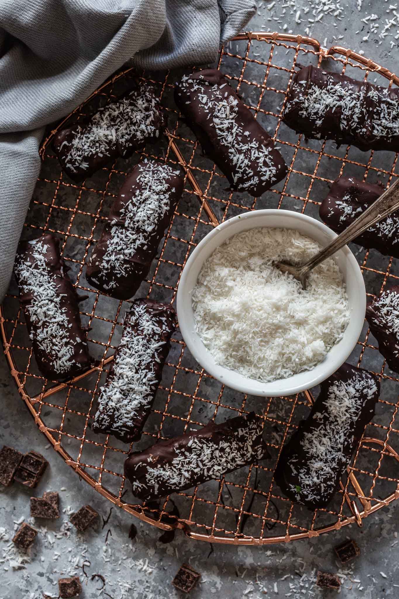 Overhead of a cooling rack full of low carb coconut bars