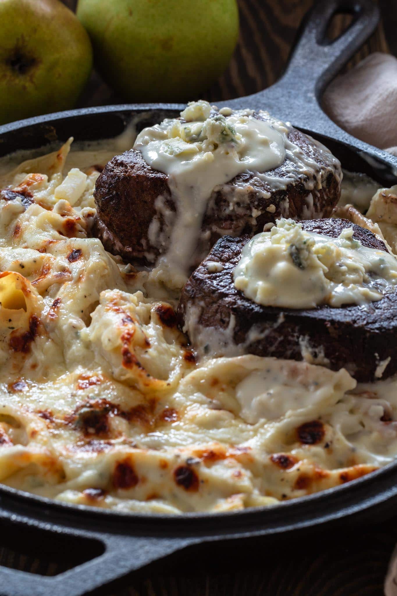 Two succulent filet mignon steaks topped with gorgonzola sauce and served with conchiglioni gratin.