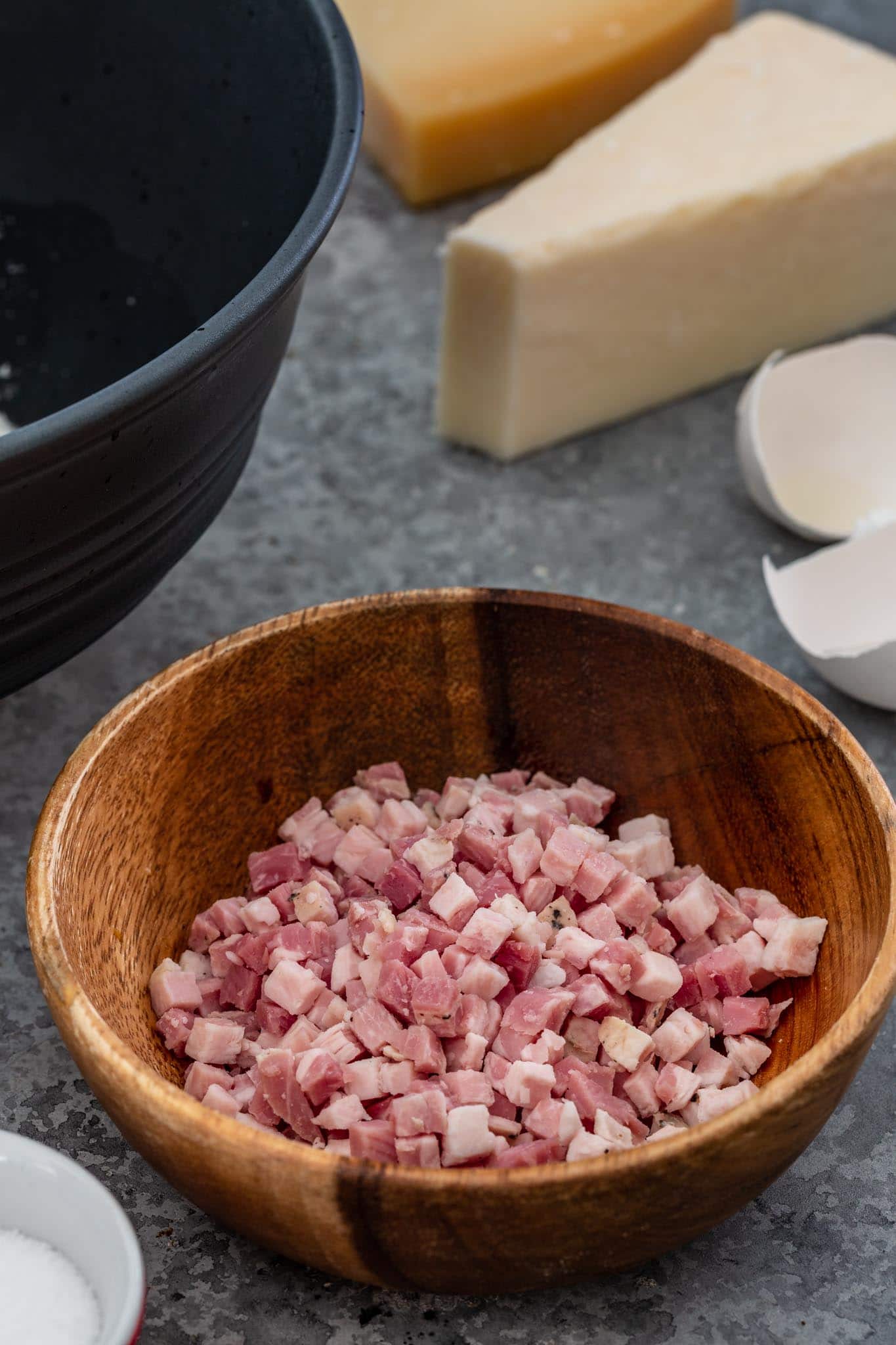 A bowl of diced pancetta.