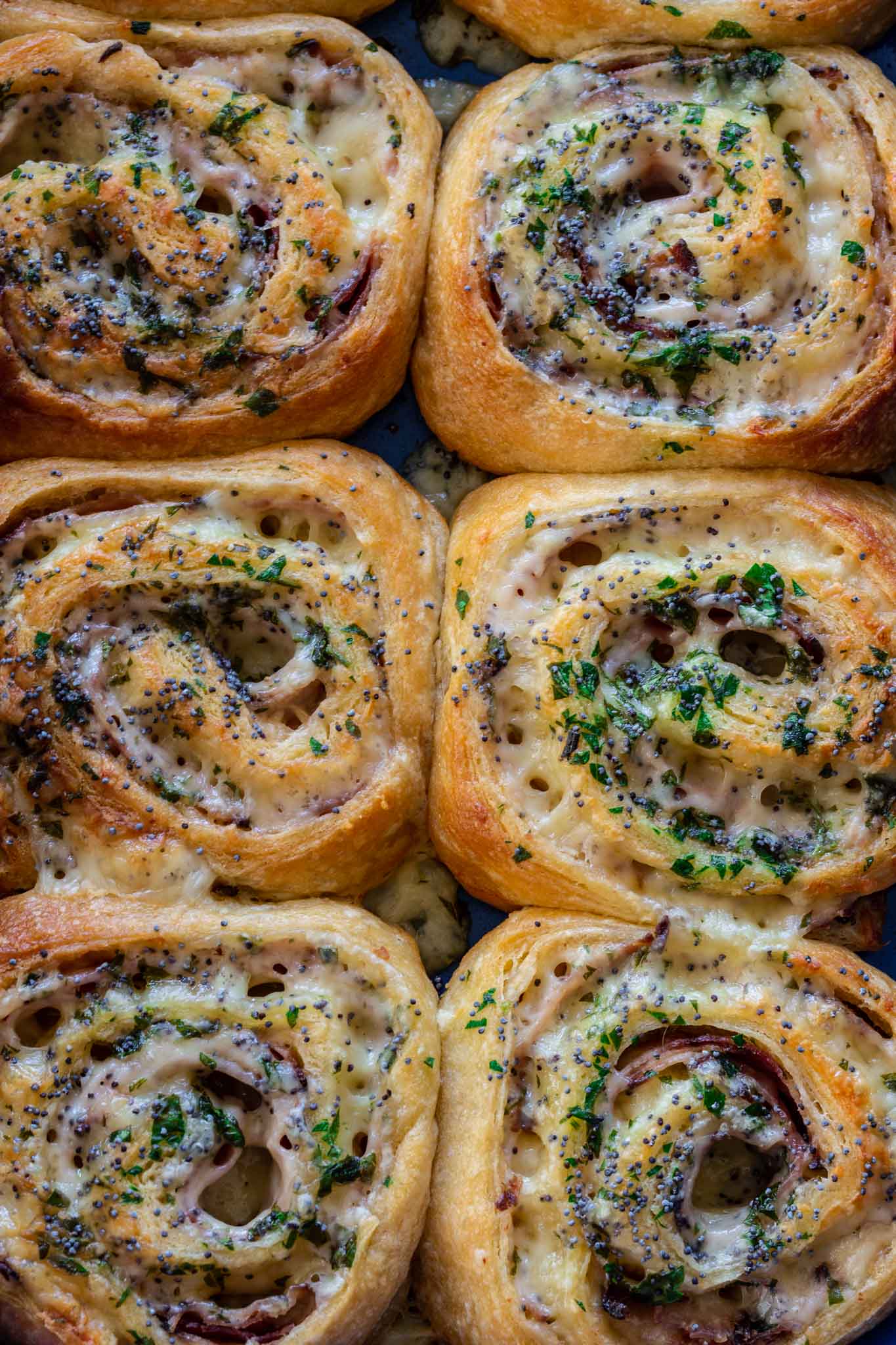 Fresh ham and cheese pinwheels right out of the oven.