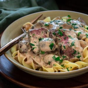 Thumbnail of beef stroganoff over noodles.