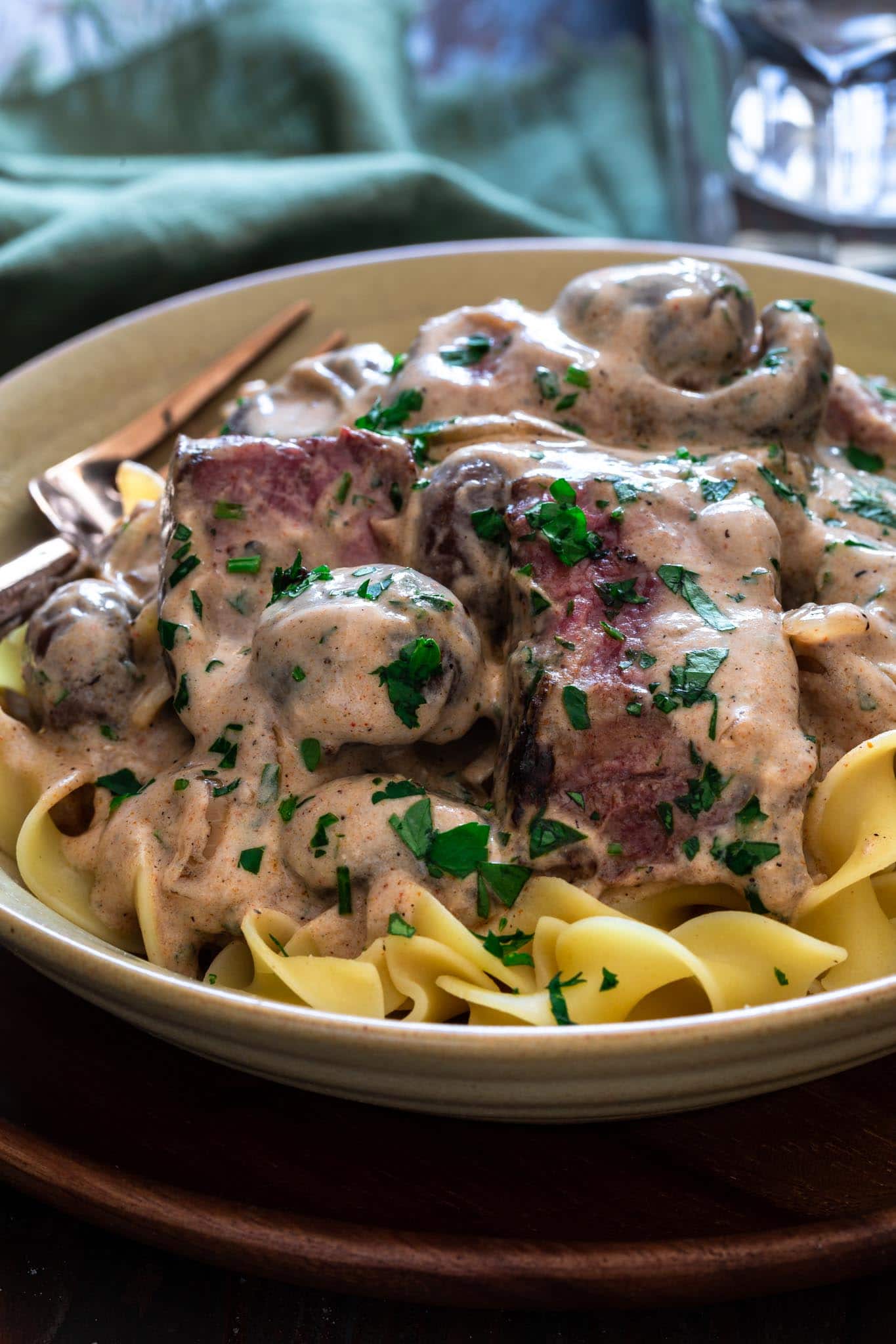 Close up of a bowl of beef stroganoff.