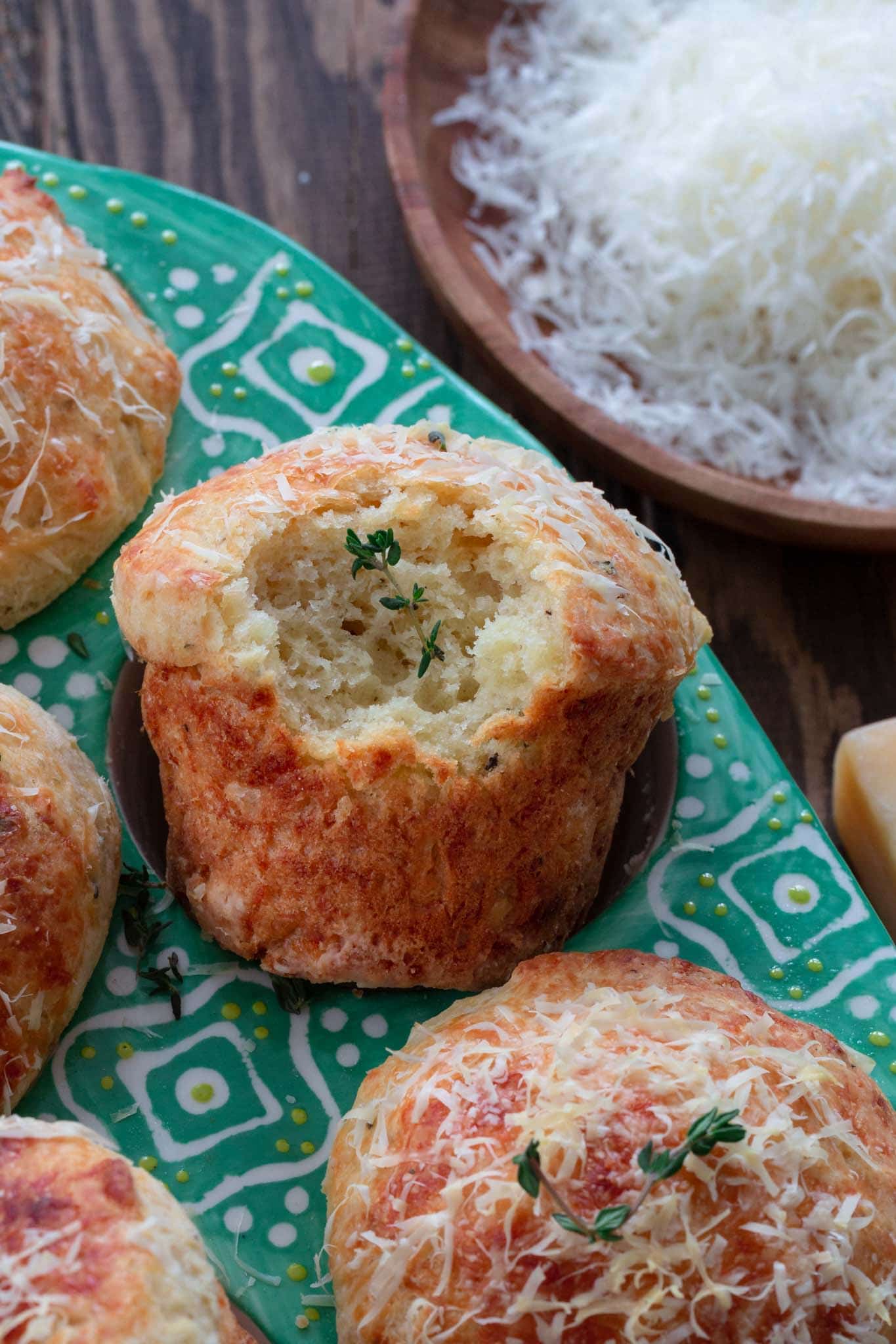 A close up of the inside of a parmesan cheese muffin