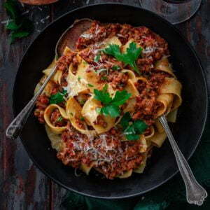 A serving of pasta with bolognese sauce
