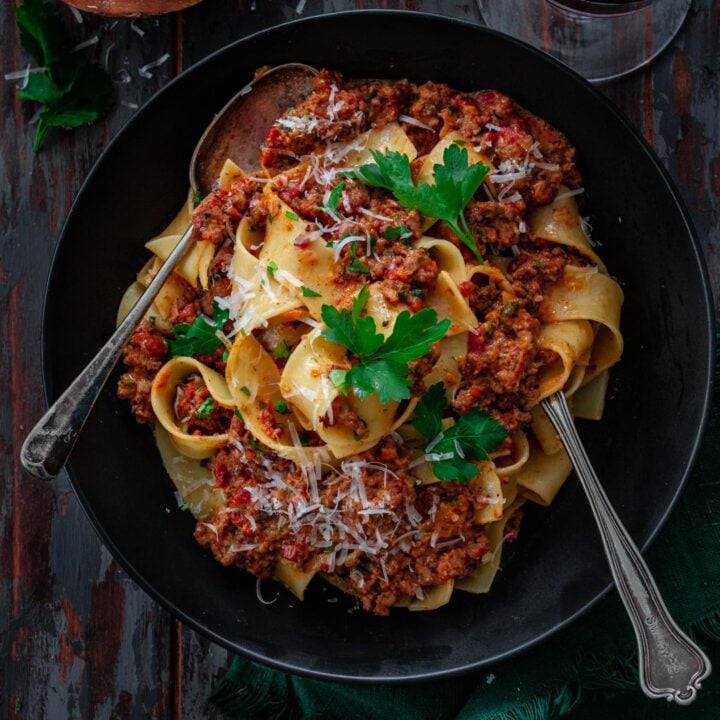 A serving of pasta with bolognese sauce