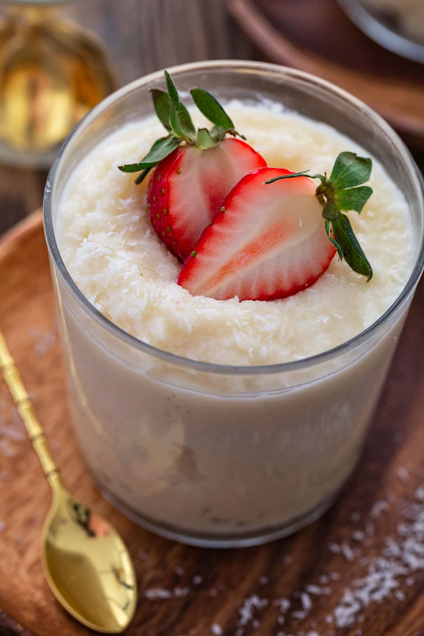 A close up of a glass of Brazilian cocada.