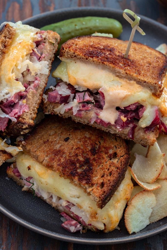 Corned beef sandwich with cheese, sauerkraut and Russian dressing.