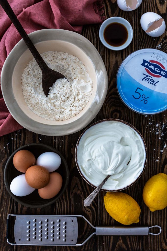 Ingredients for French Yogurt Cake: yogurt, eggs, lemon zest, vanilla extract.
