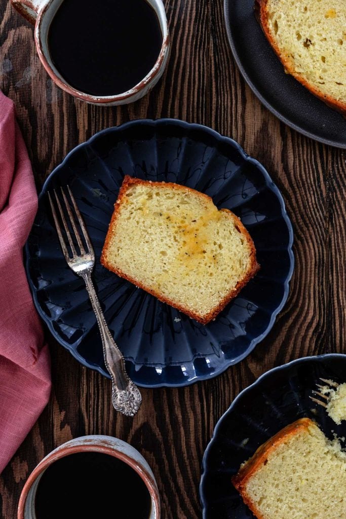 A few slices of yogurt cake served with black coffee.