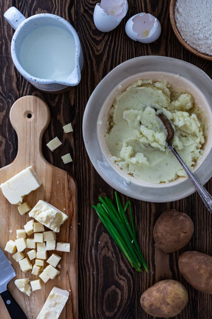 Ingredients to make cheese potato pancakes.