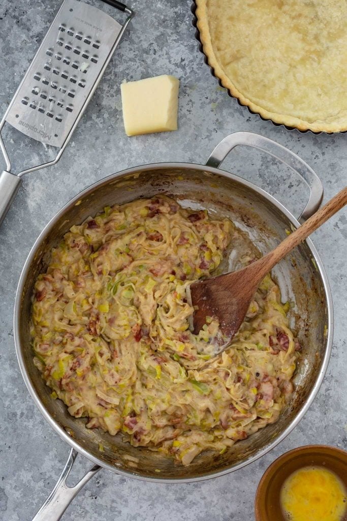 A pan of leek tart filling.