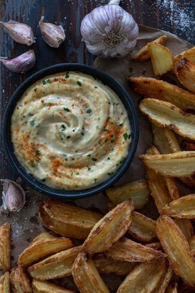 A creamy Roasted Garlic Aioli with French fries.