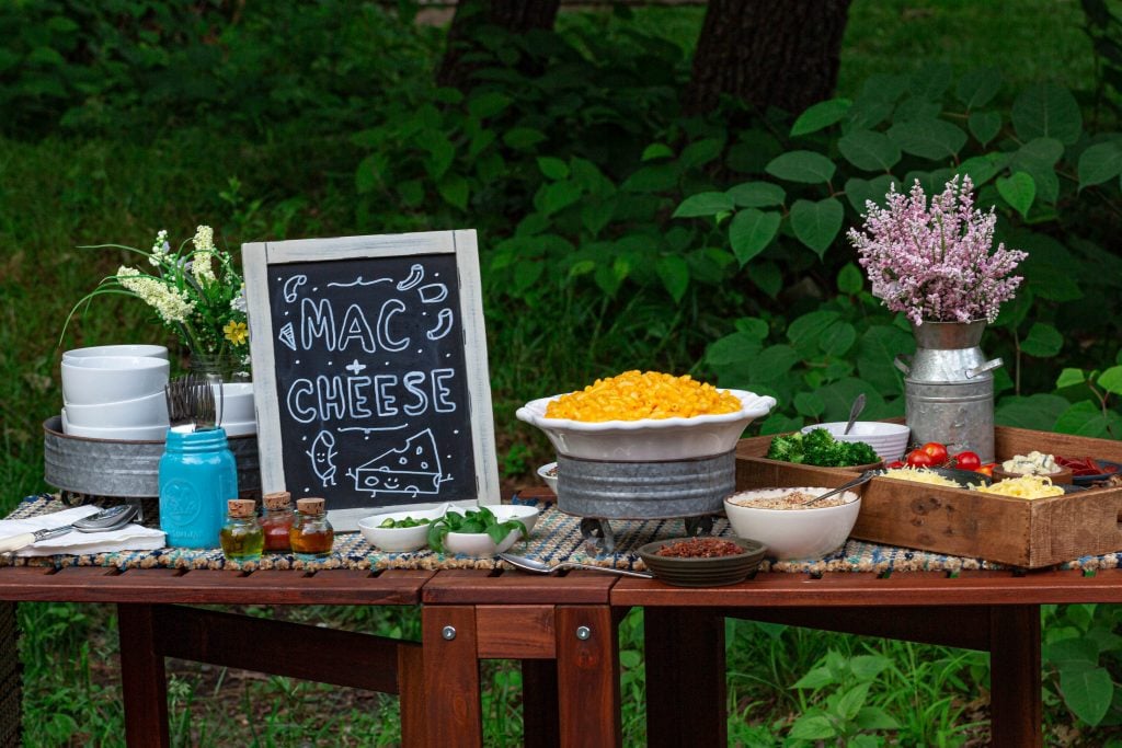 A macaroni and cheese station table.