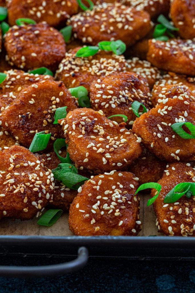 Oven baked chicken nuggets glazed with honey and garlic.
