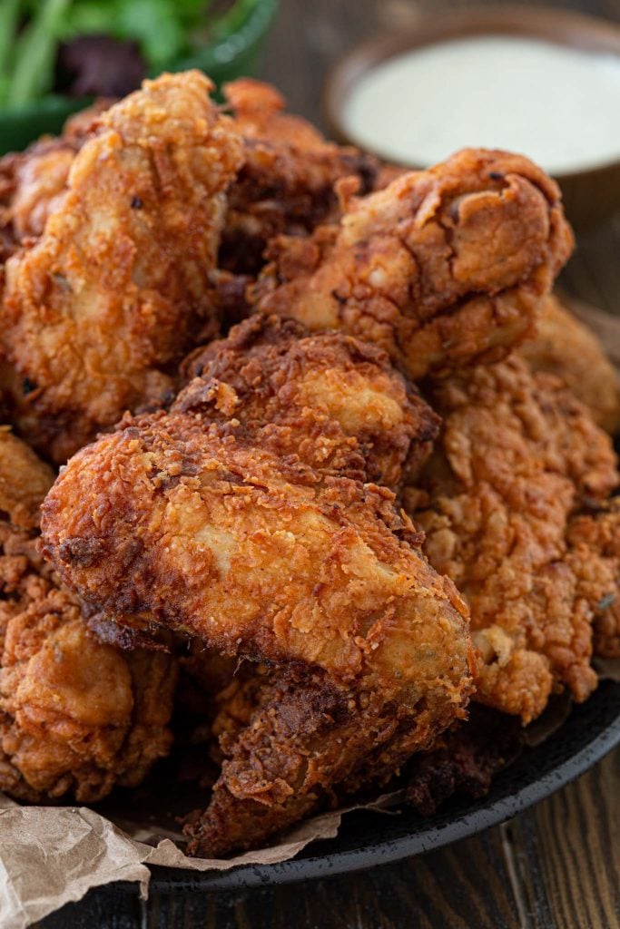 A close up of the crispiest fried chicken.