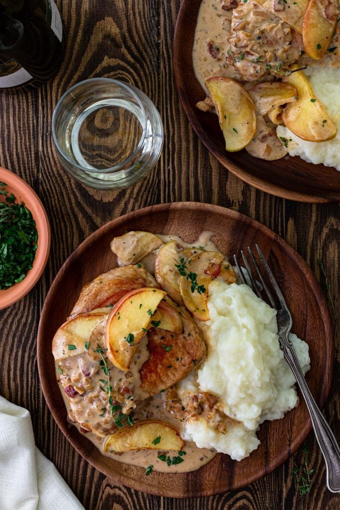 Pork chops served with mashed potatoes