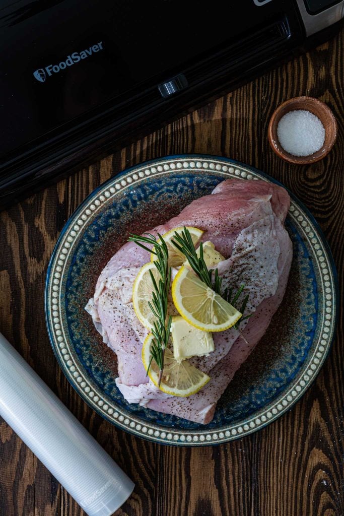 Turkey breast seasoned with lemon, rosemary and butter, vacuum sealed with FoodSaver.