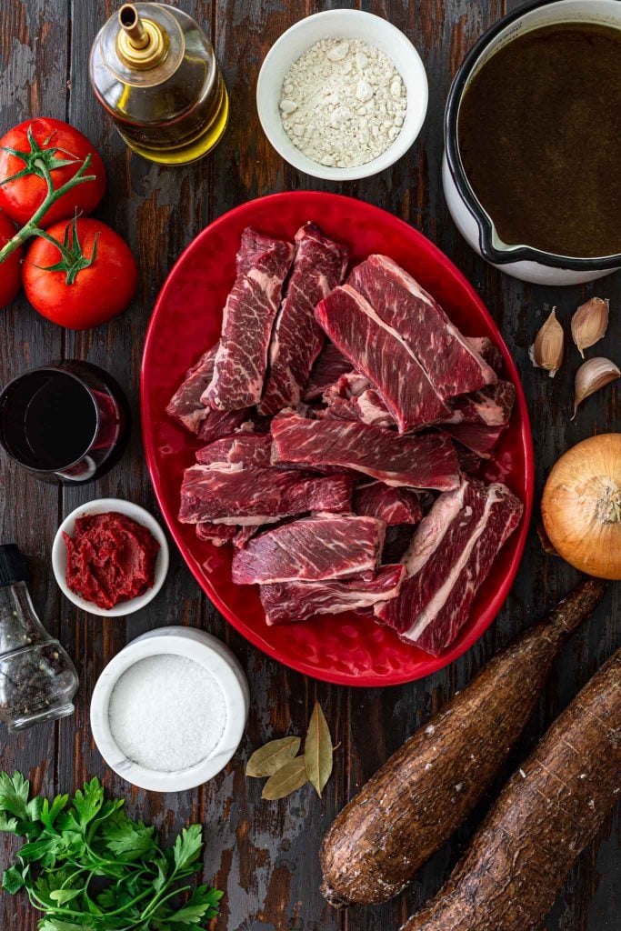 Ingredients to make short ribs beef stew with yucca.