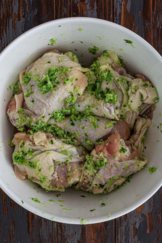 Marinating chicken with sofrito.