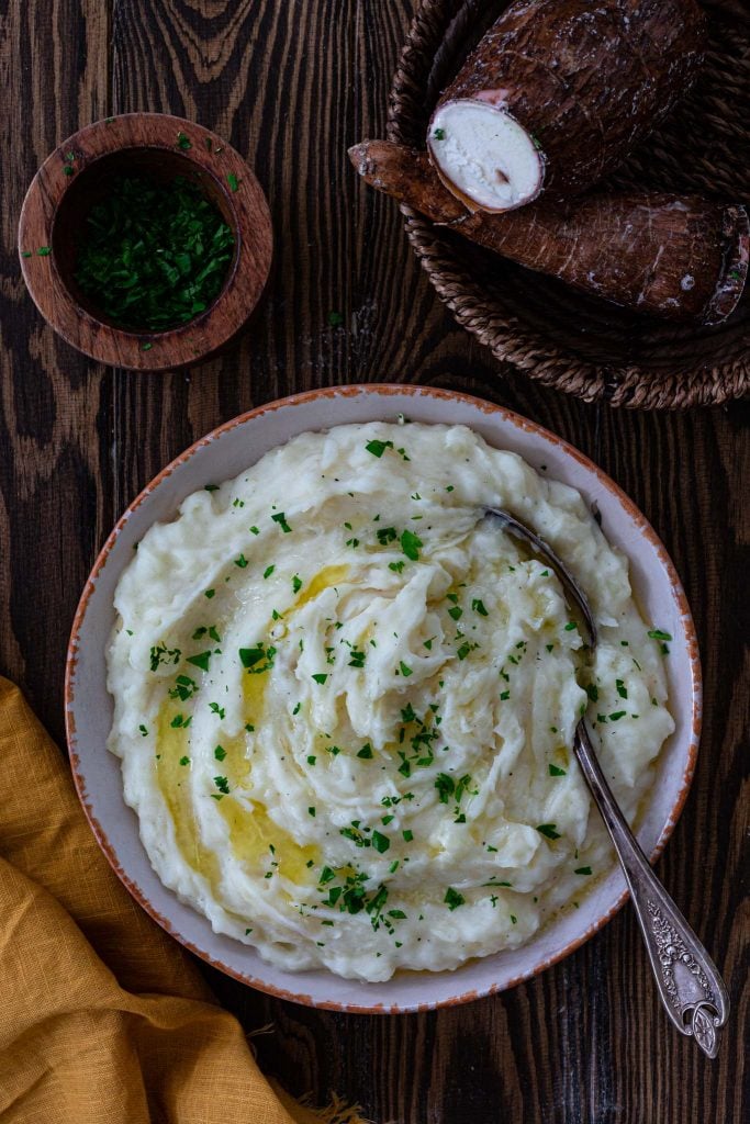 Pureed yuca topped with butter and herbs.