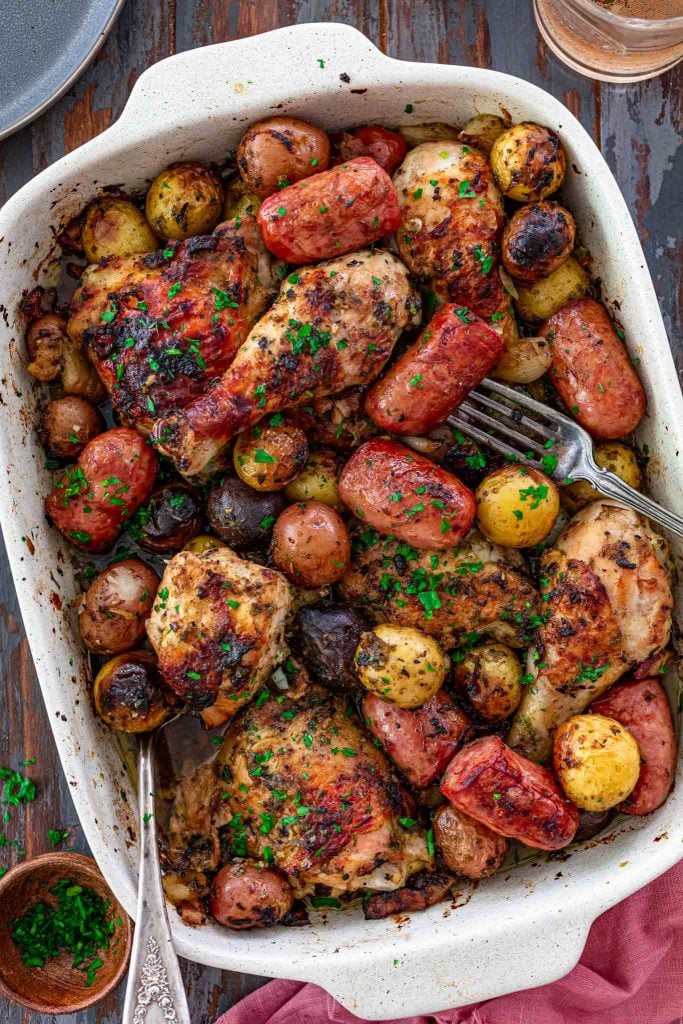 Baked chicken with potatoes and sausage.