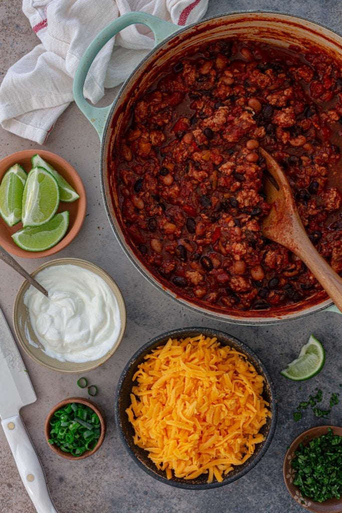 Toppings: cheese, sour cream, lime, green onions and cilantro.