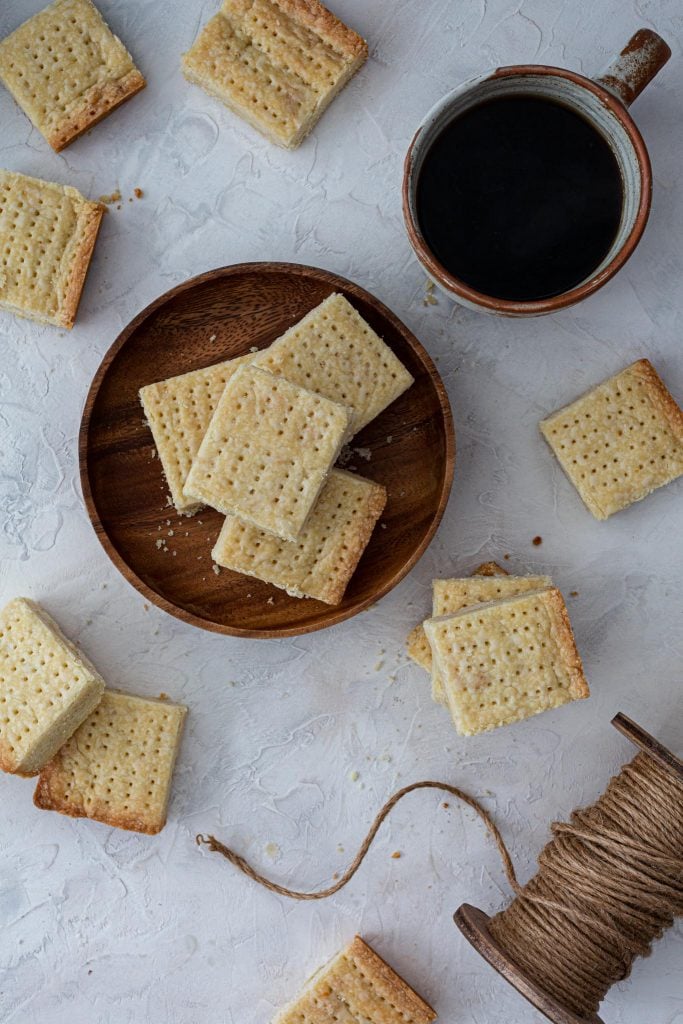 Scottish cookies, served with a cup of black coffee.