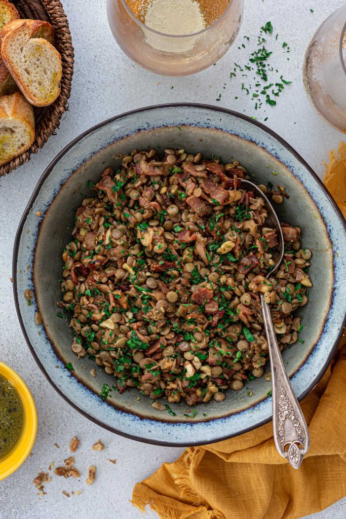 Warm lentil salad with bacon and walnuts.