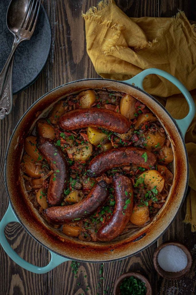 An Irish stew with sausages and potatoes.