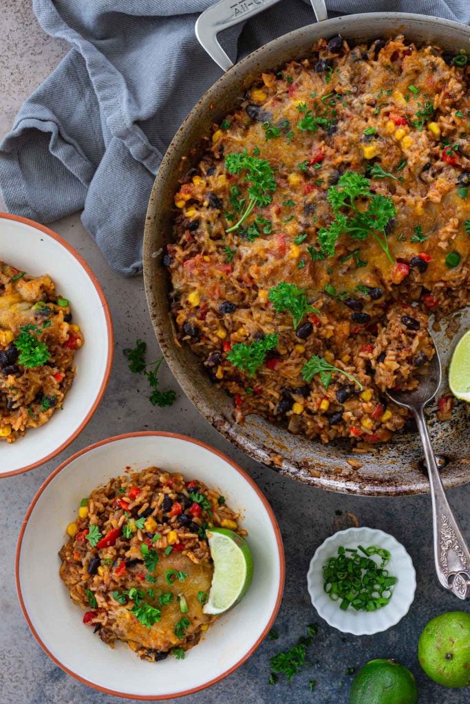 Two servings of Mexican beef and rice casserole.