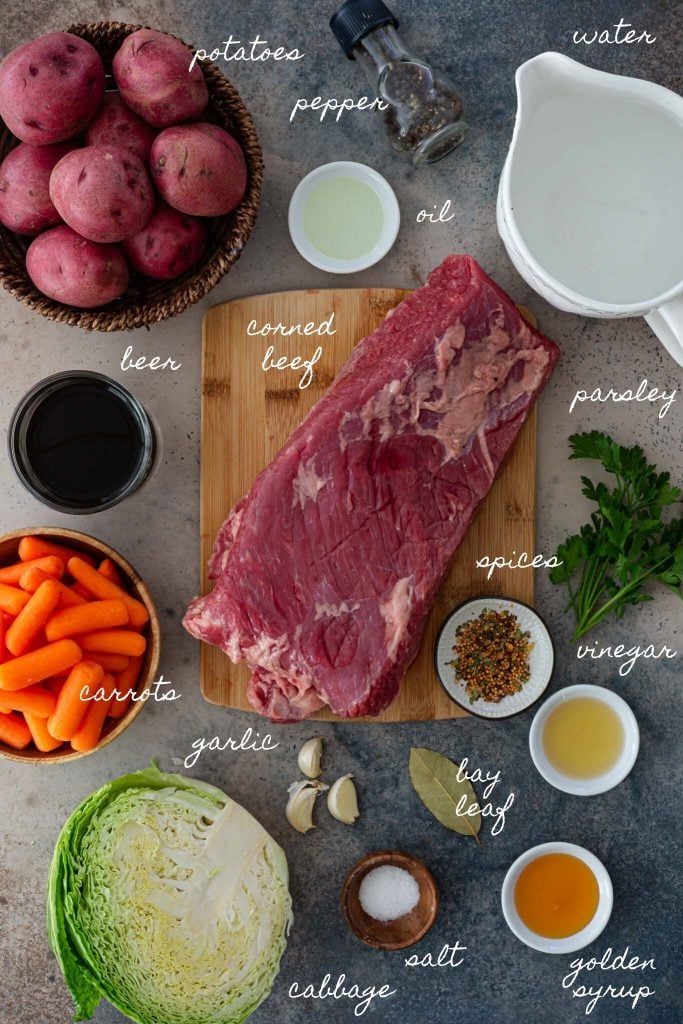 Ingredients to make corned beef in the crockpot.