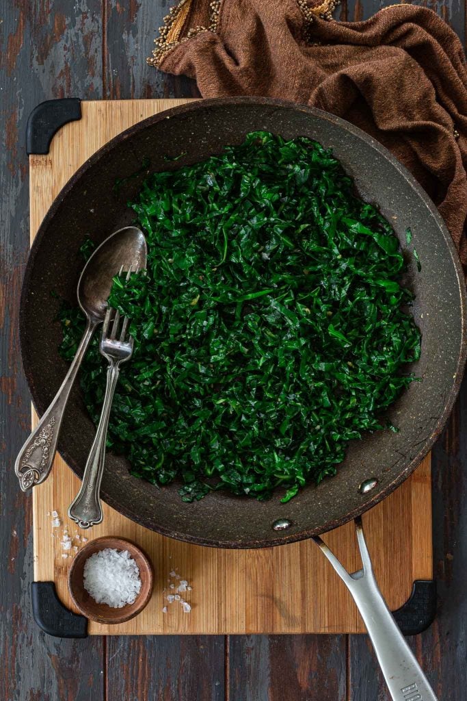 Sautéed Brazilian Collard Greens in a skillet.