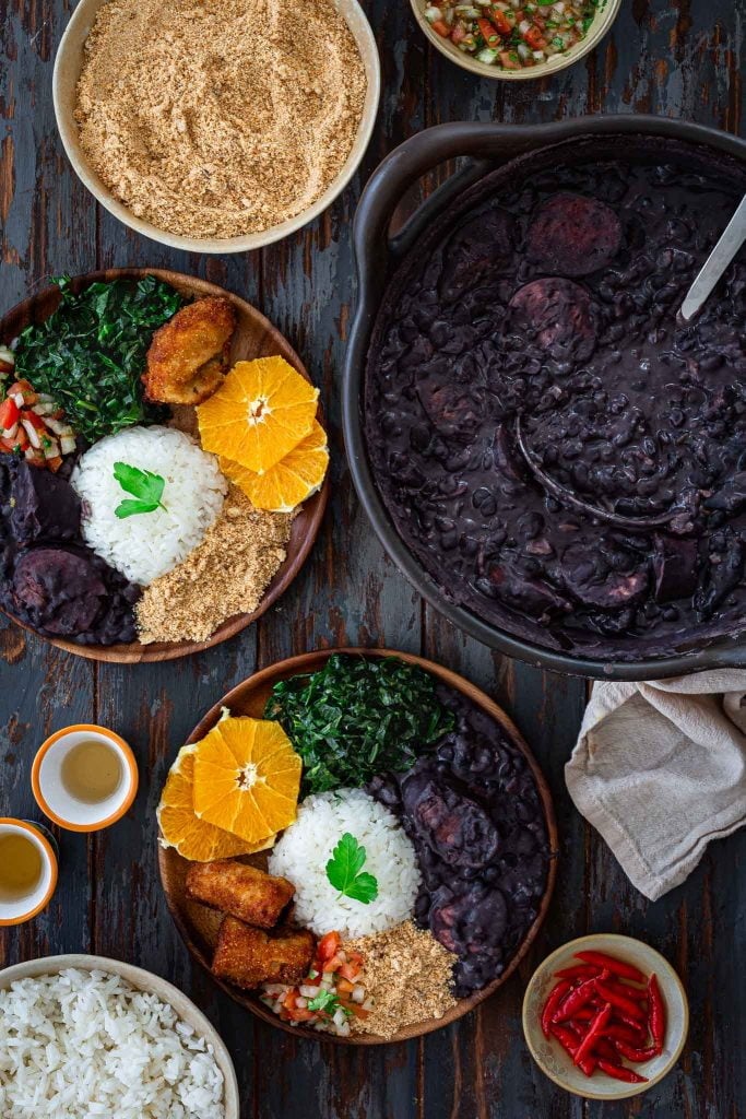 Serving feijoada.