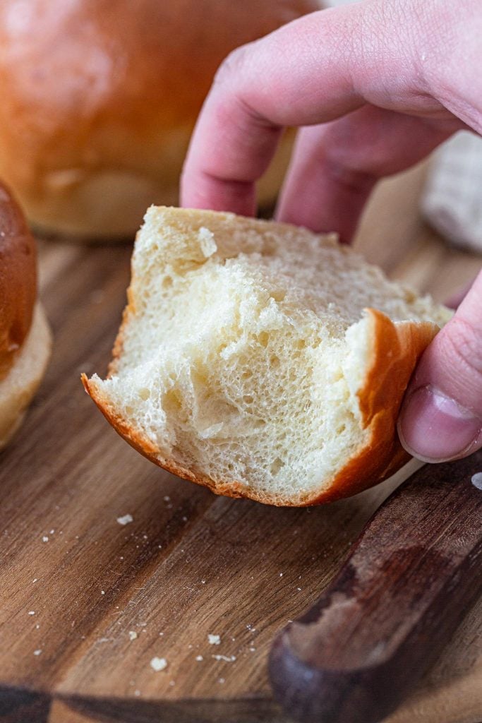 The soft crumb of a brioche bun.