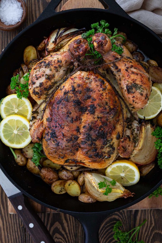 A close up shot of a perfect roasted chicken.