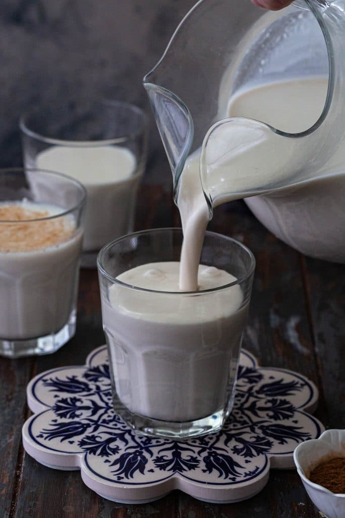 Pouring Mexican Horchata in a glass.