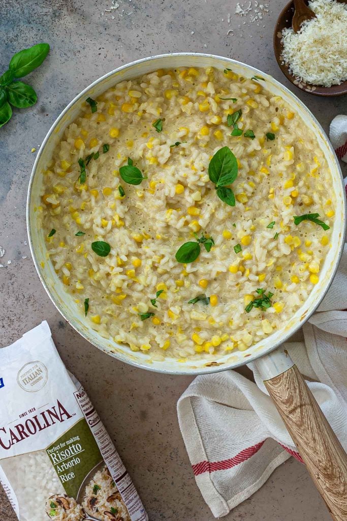 A pan of creamy corn risotto.