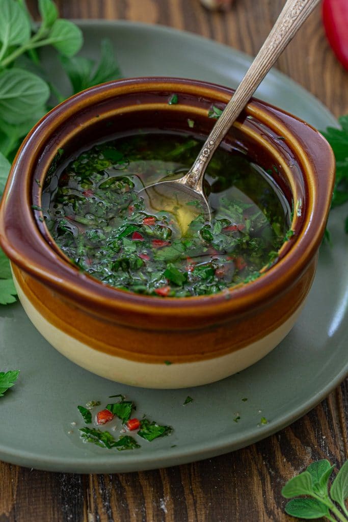 Closeup shot of green chimichurri.