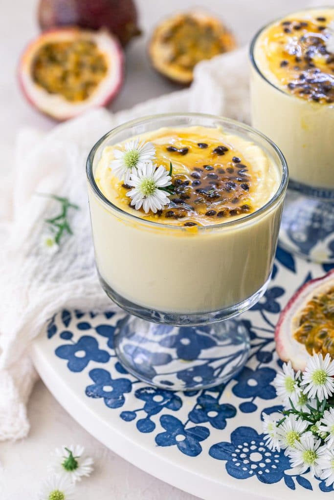 Close up of a glass of passion fruit mousse.