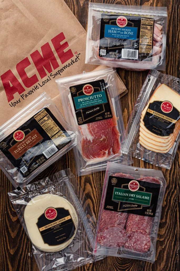 An ACME shopping bag and different Primo Taglio products.