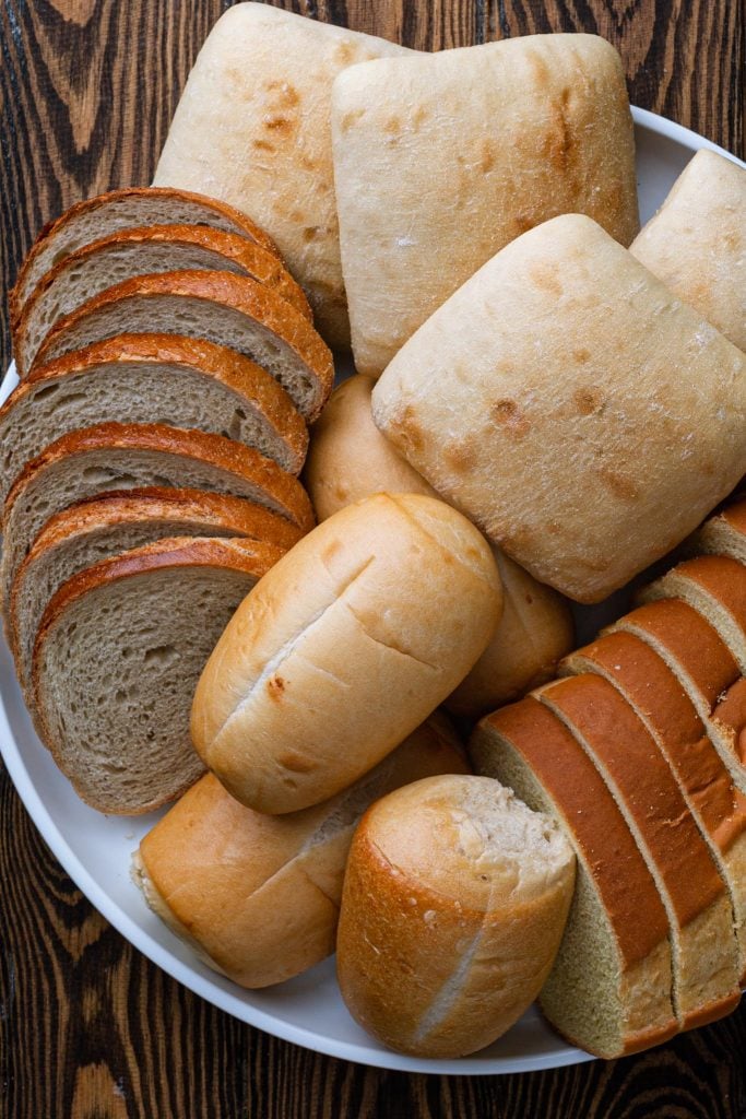 A platter with several different types of bread.