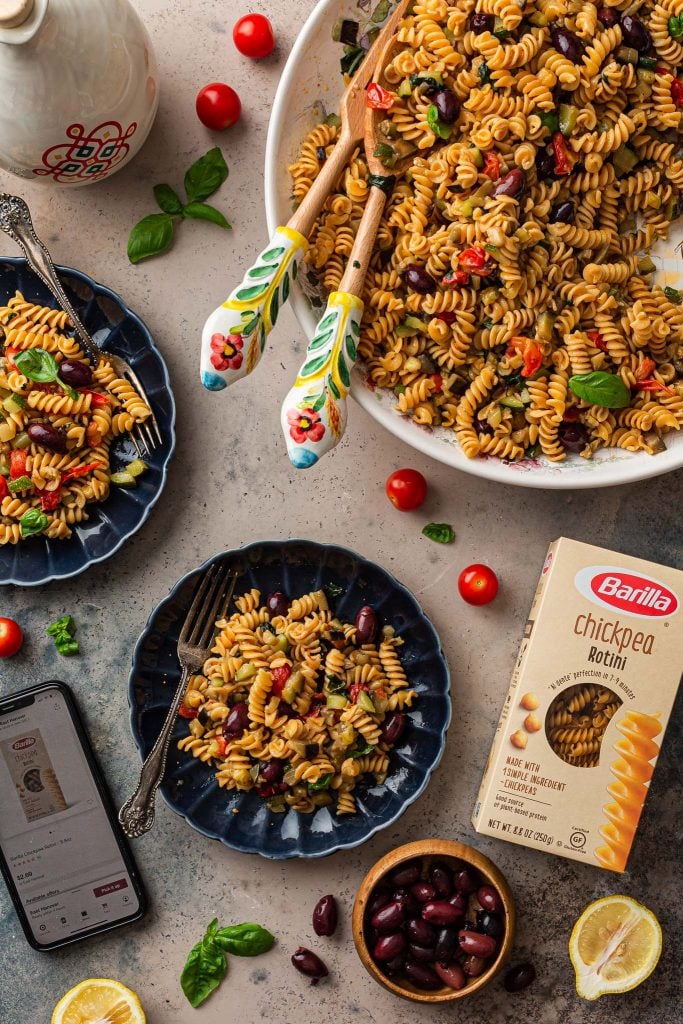 Overhead photo of the pasta with a box of Barilla and a cellphone with the shopping page.