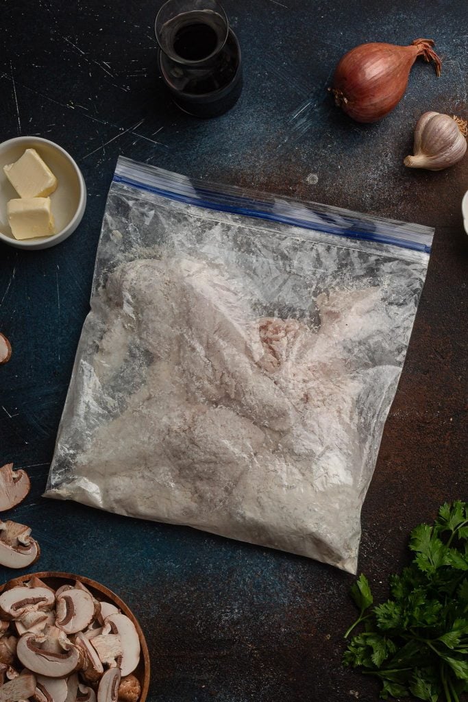 An overhead photo of the chicken in a ziploc bag.
