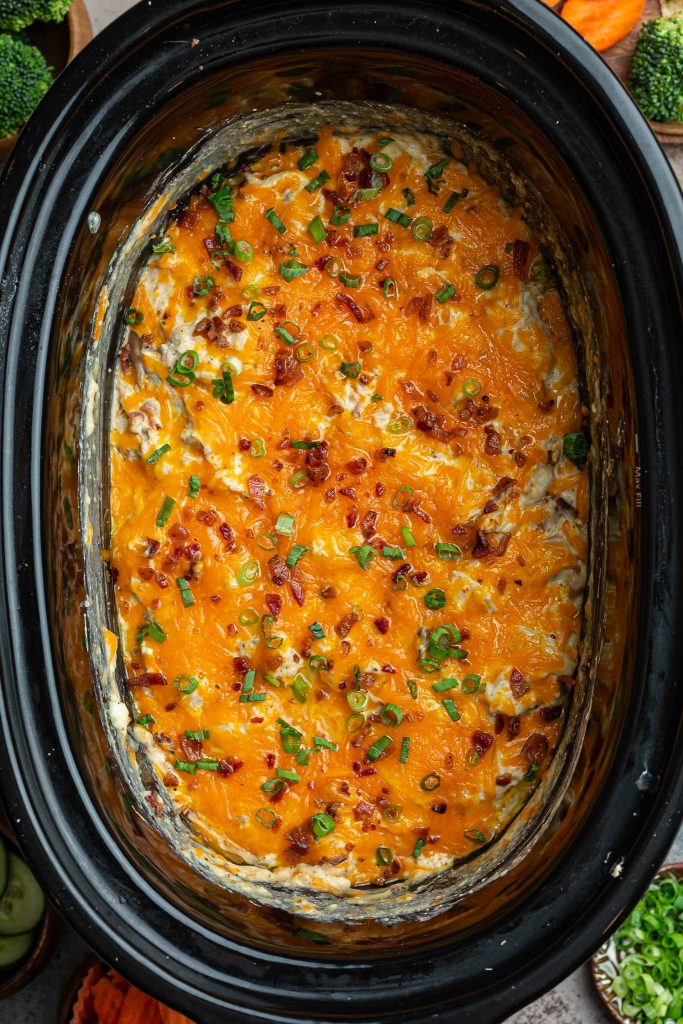 A closeup shot of the slow cooker chicken dip.