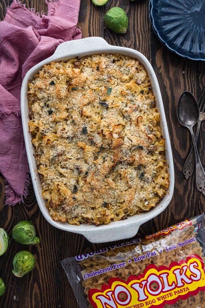 An overhead shot of the casserole and a package of No Yolks.