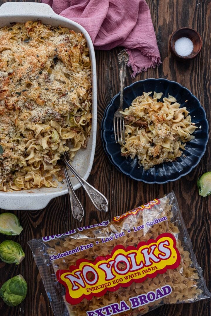 The Sausage and Brussels Sprouts casserole, a plate and a package of No Yolks.