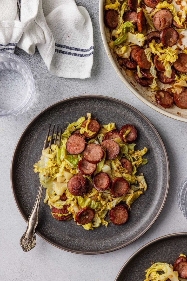 An individual plate with Sausage and Cabbage Skillet.